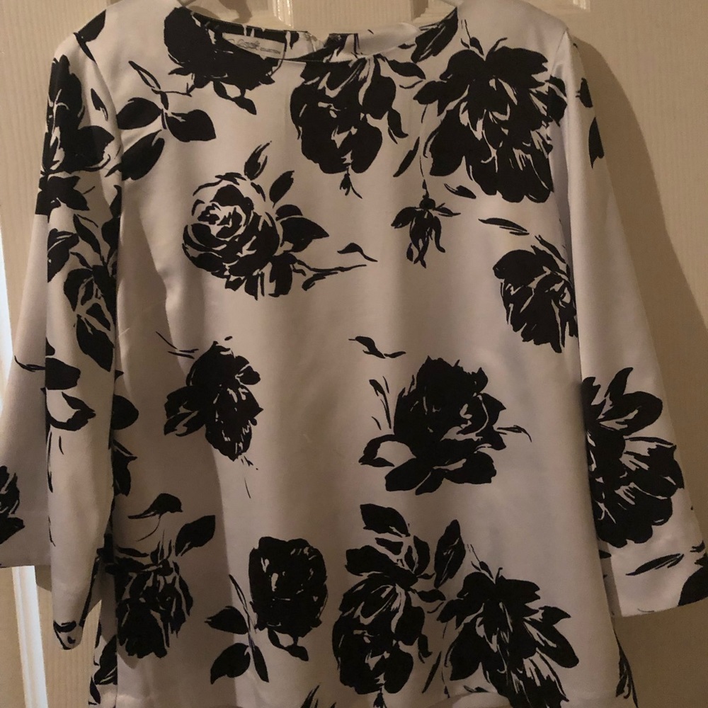 White blouse with roses